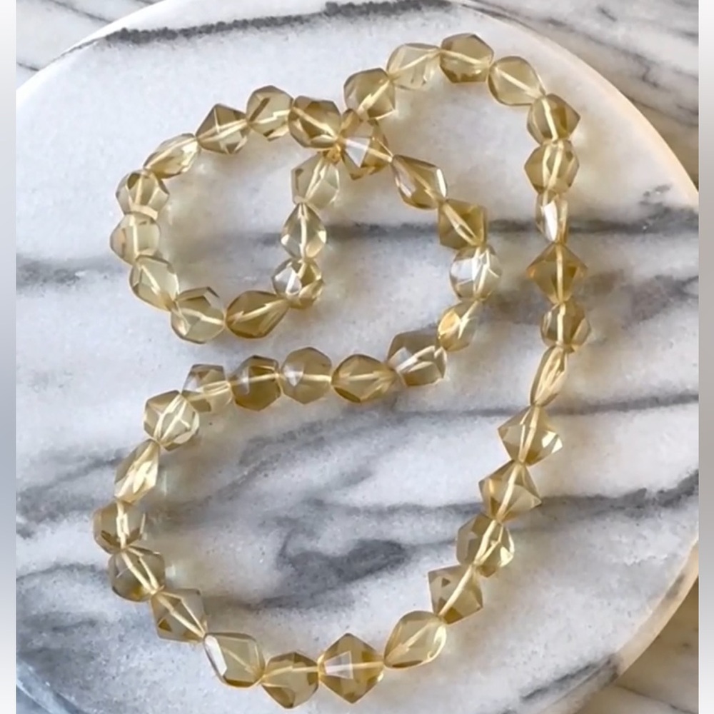 Club Monaco pale gold cut acrylic necklace